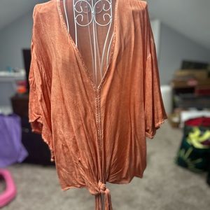 Entro brand size Medium v neck blouse with ties at waist.